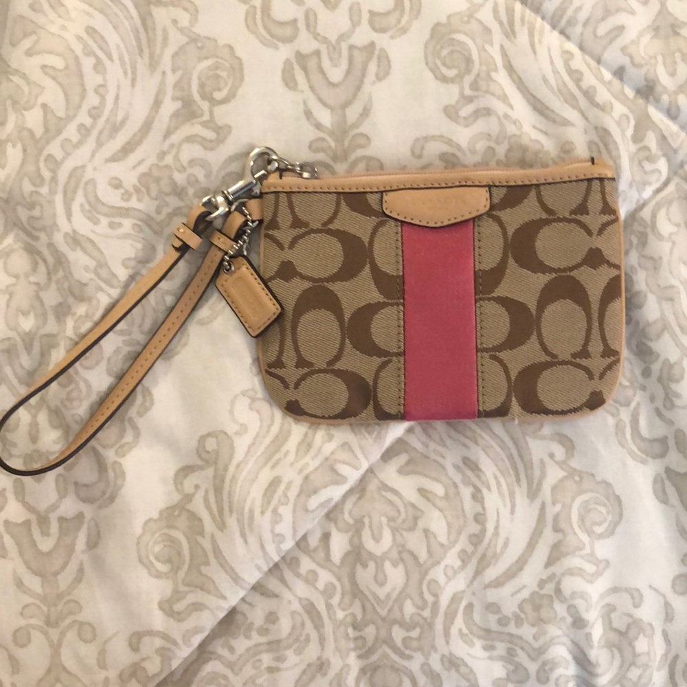 Small COACH wristlet with a little pop of color!